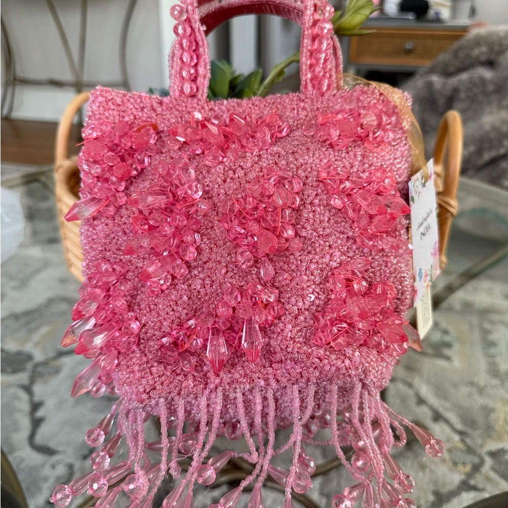 Vibrant Pink Mini Bag with Plush Texture and Sparkle